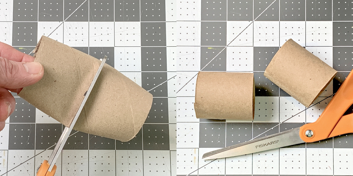 Cutting a toilet paper roll in half with a pair of scissors