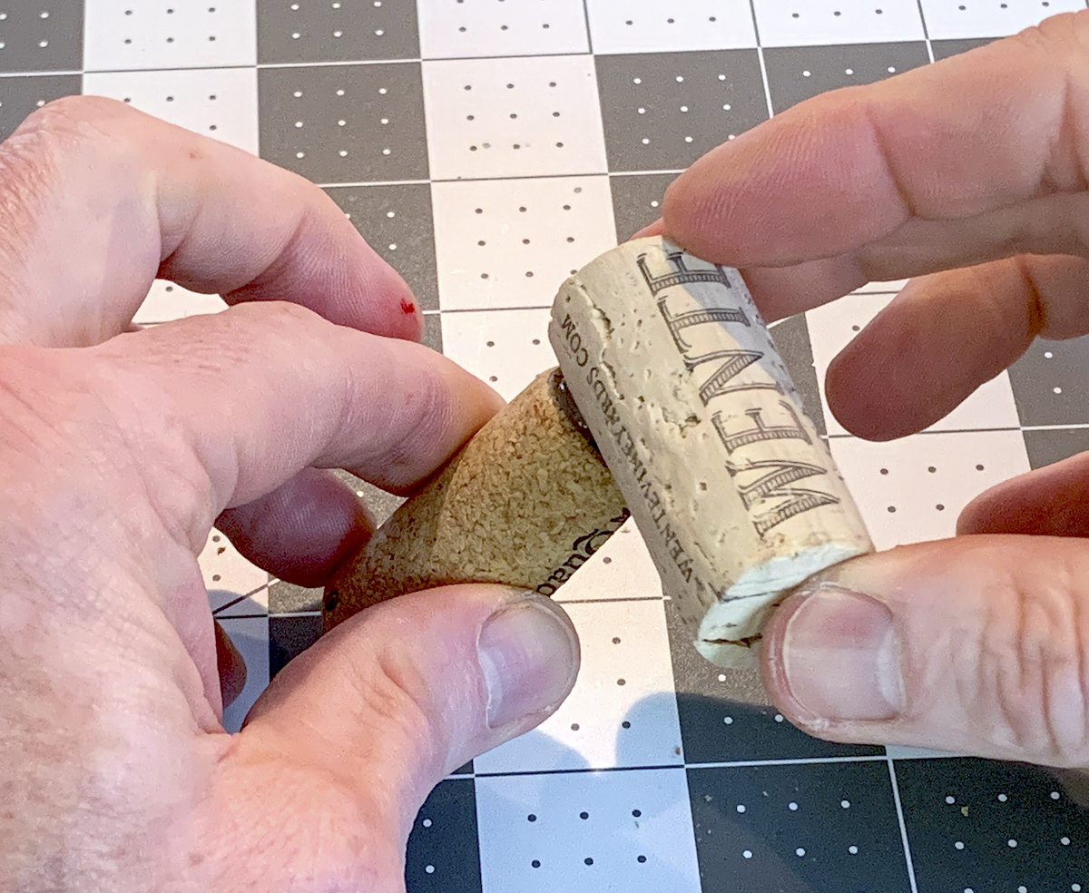 Gluing wine cork to another wine cork