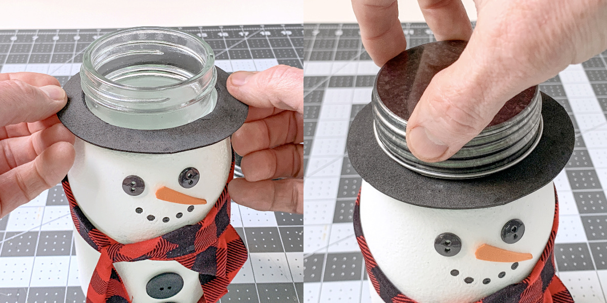 Hand placing the brim down onto the snowman jar lip