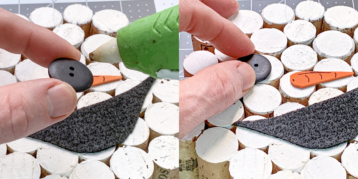 Hot gluing a button eye to the wine corks