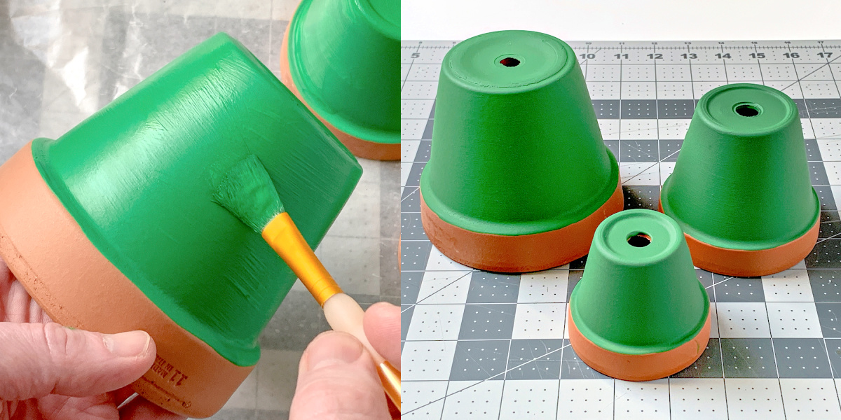 Painting the base of three clay pots with bright green craft paint