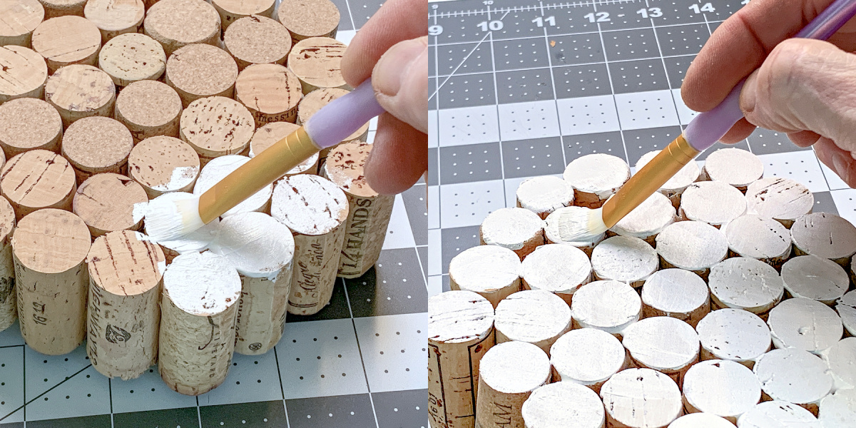 Painting the ends of wine corks with white acrylic paint