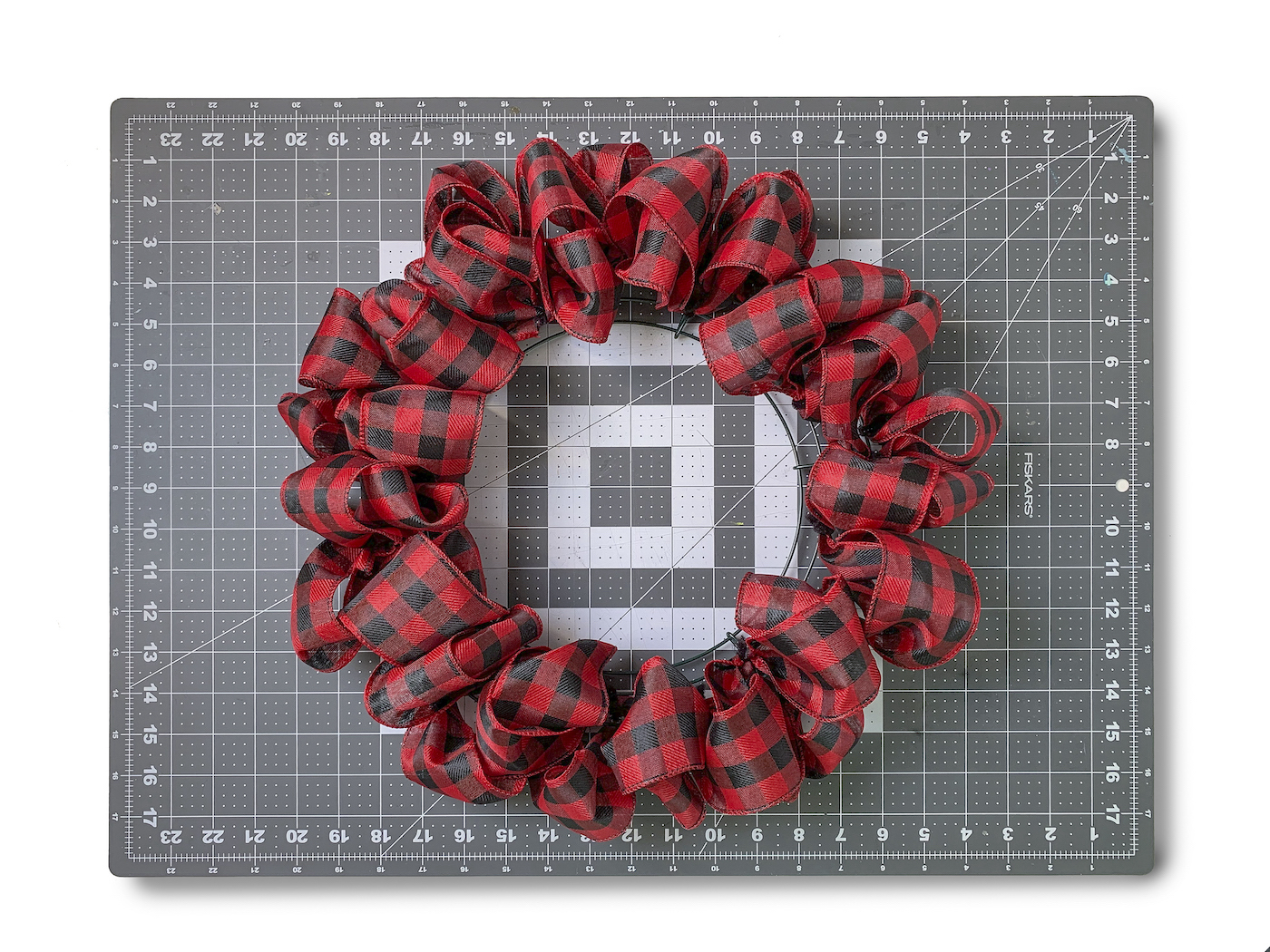Second ring of ribbon attached with pipe cleaners