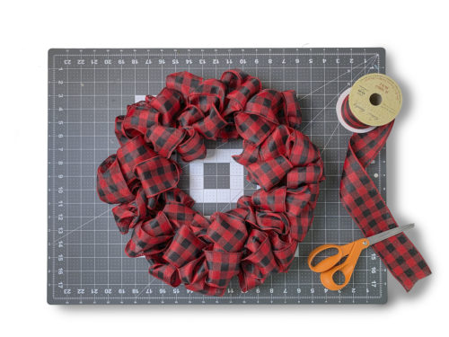 Third ring of ribbon attached with pipe cleaners