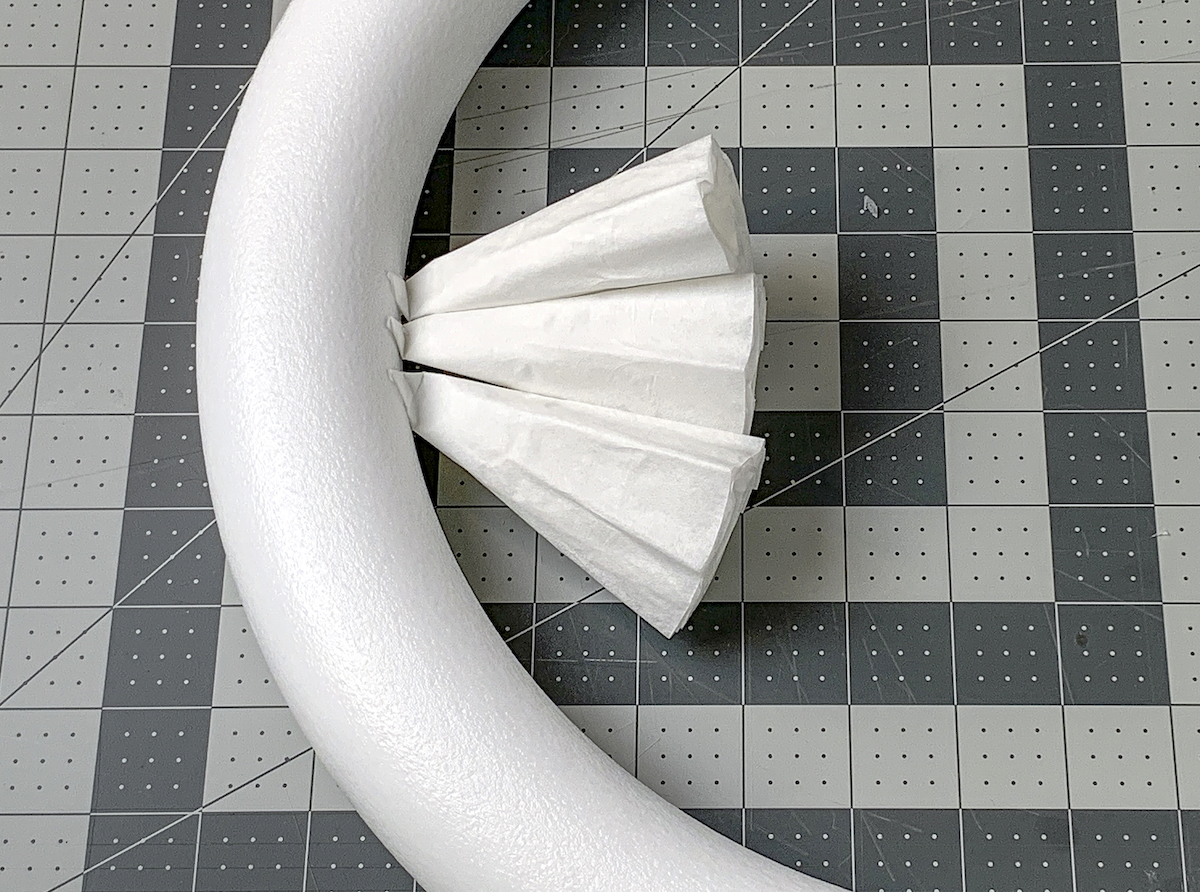Three coffee filters glued to the inside of a wreath form