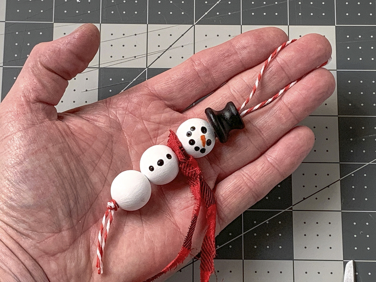 Scarf added to the wood bead snowman ornament