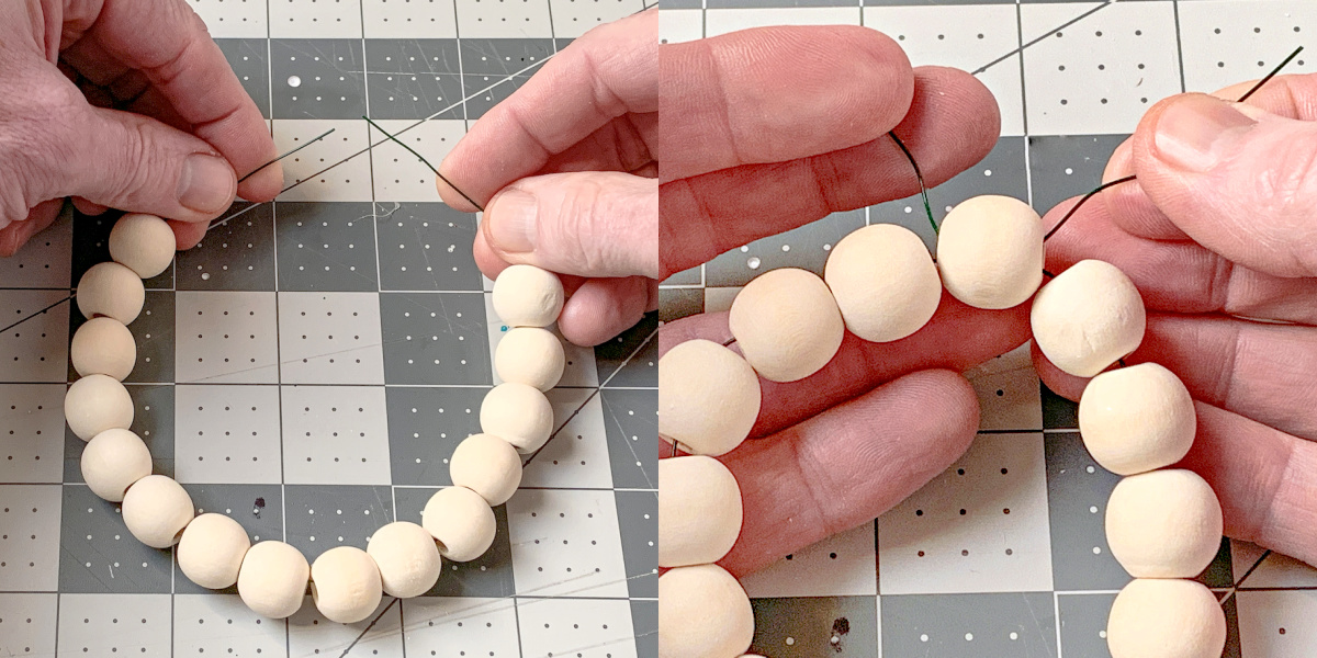 Threading a final round wood bead onto floral wire to create a loop