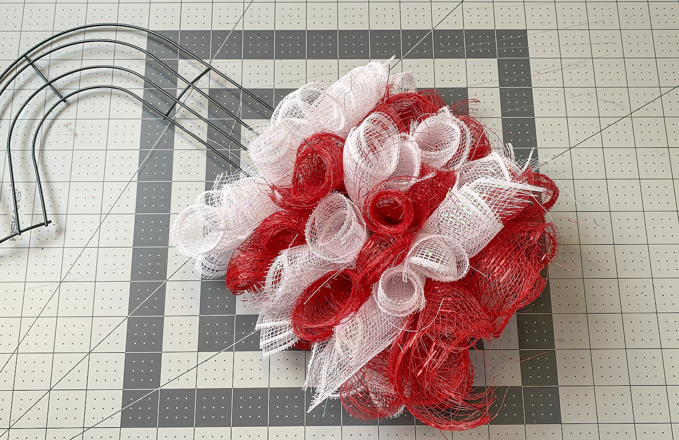 Six rows of deco mesh attached to the candy cane wreath form