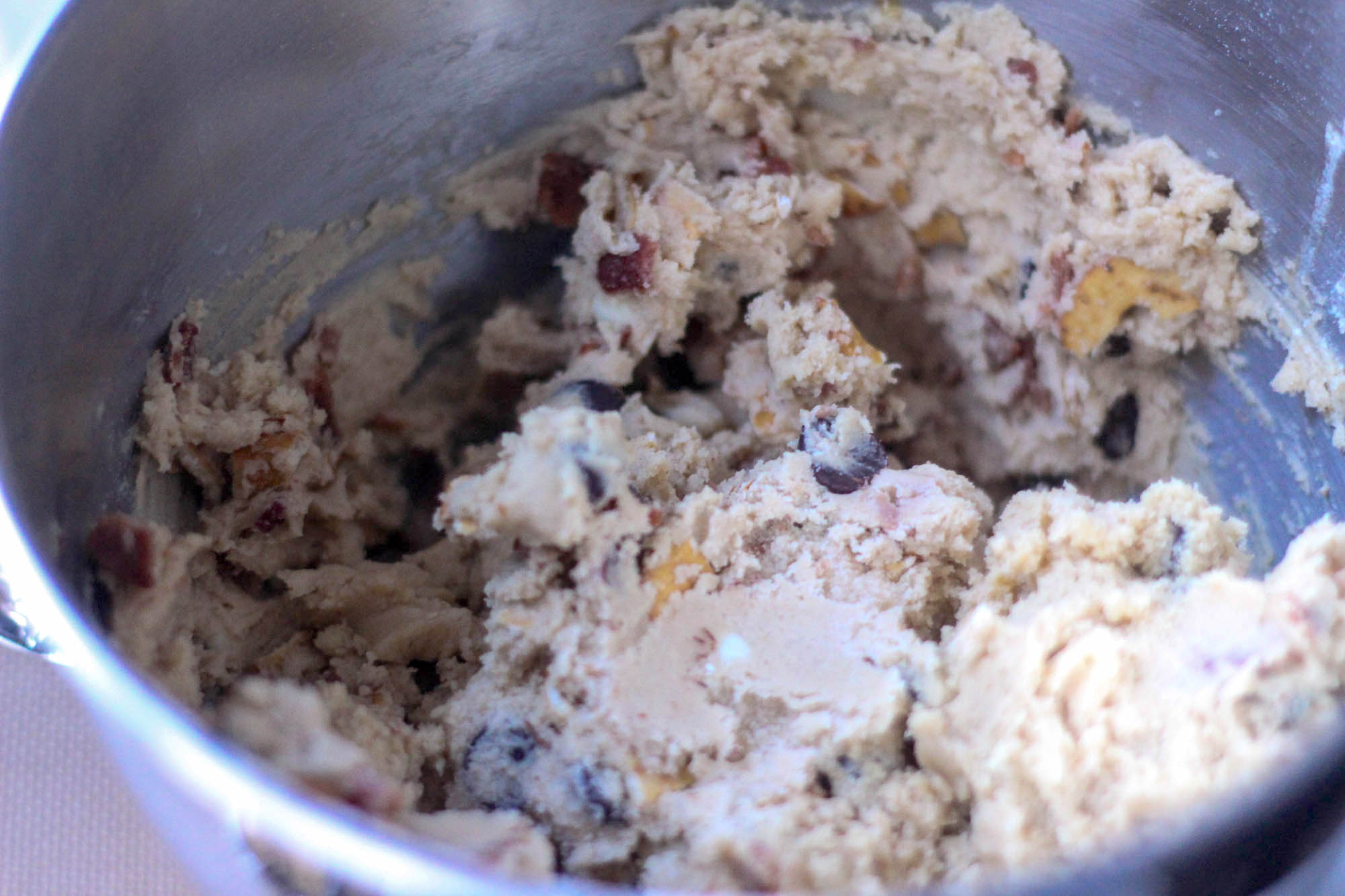 Adding the butter mixture to the dry ingredients