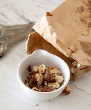 Hazelnuts in a white bowl