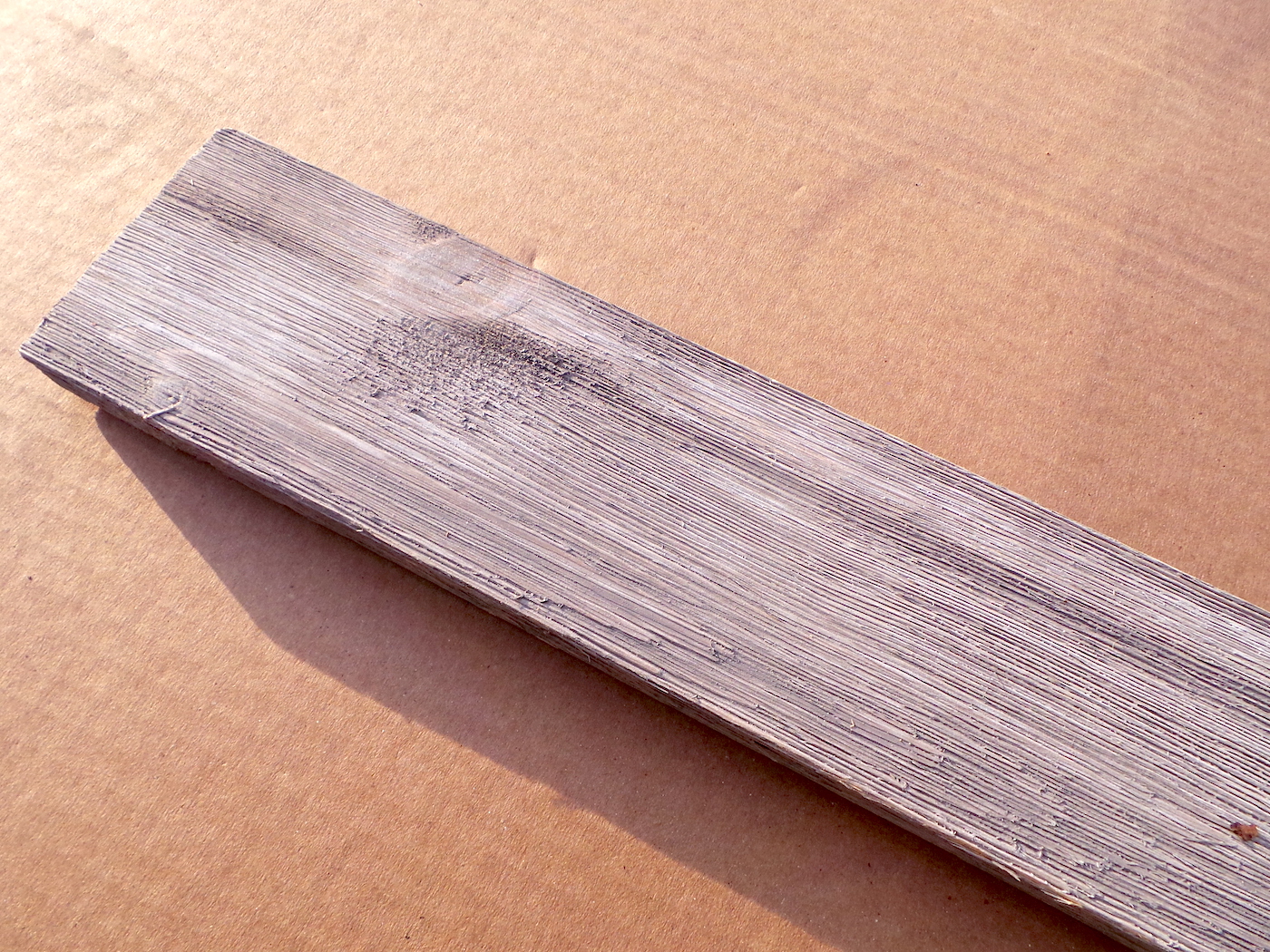 Piece-of-faux-barnwood-from-Home-Depot