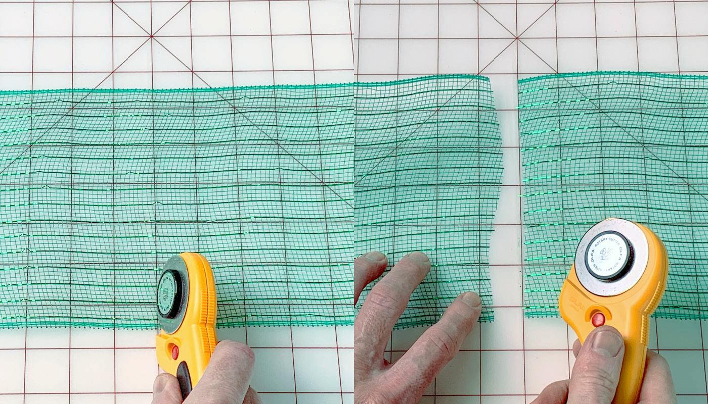 Cutting a 10 inch piece of green deco mesh with a rotary cutter
