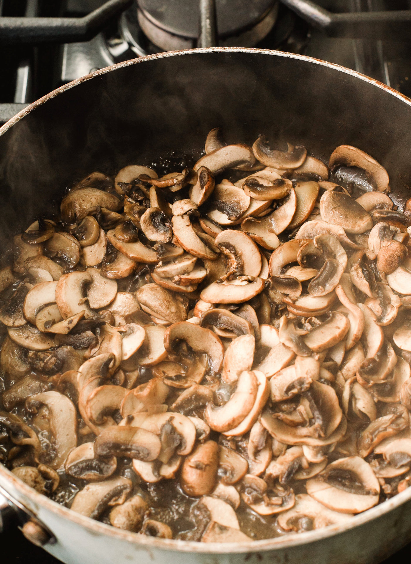 Mushrooms cooking in the pan