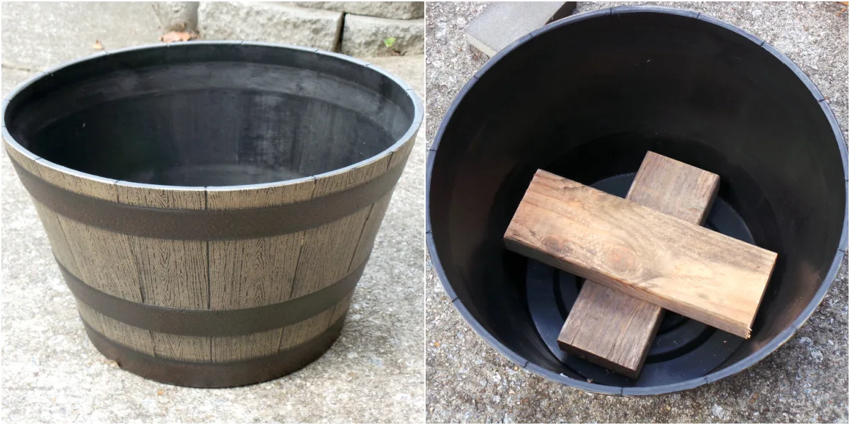 Planter with two pieces of wood in the bottom
