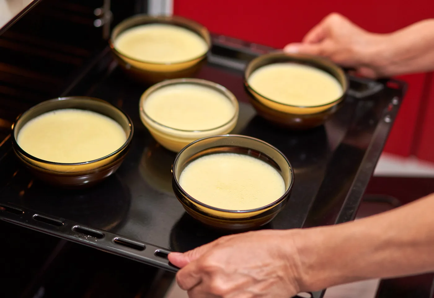 Removing-creme-brulee-from-the-oven