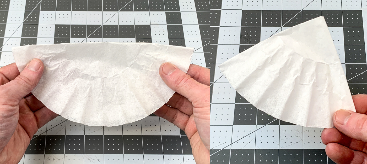 Folding a coffee filter into half and then quarters
