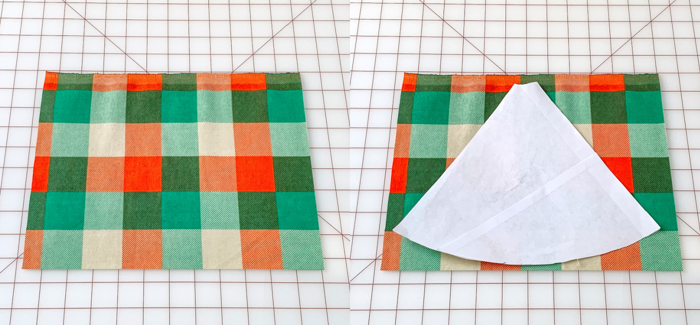 Hands placing a template on green plaid flannel fabric