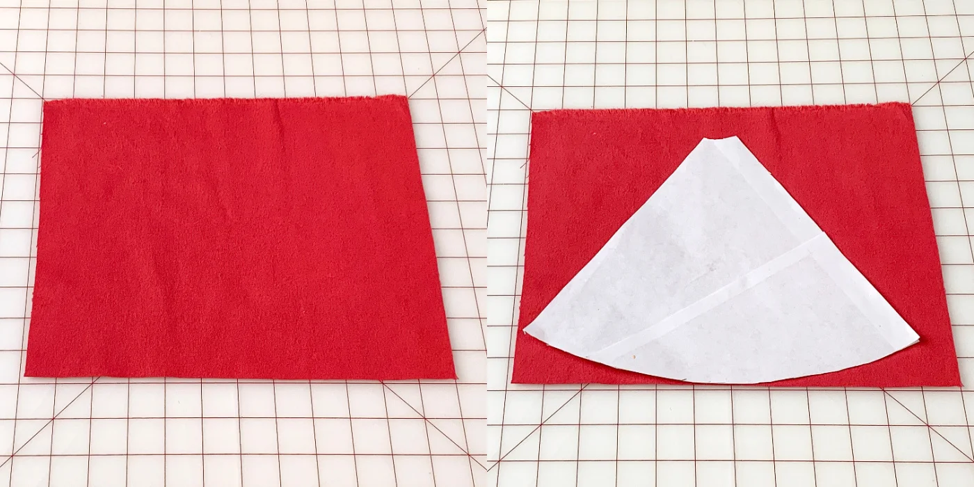 Paper template placed onto a piece of pink fabric