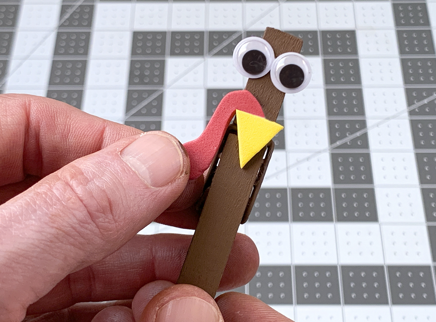 Turkey beak and waddle glued to the clothespin