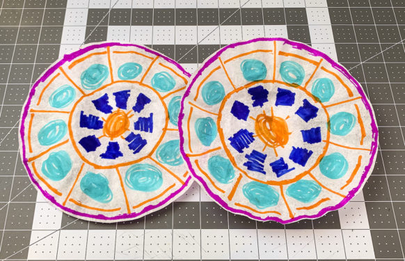 filters covered with colorful marker drawings
