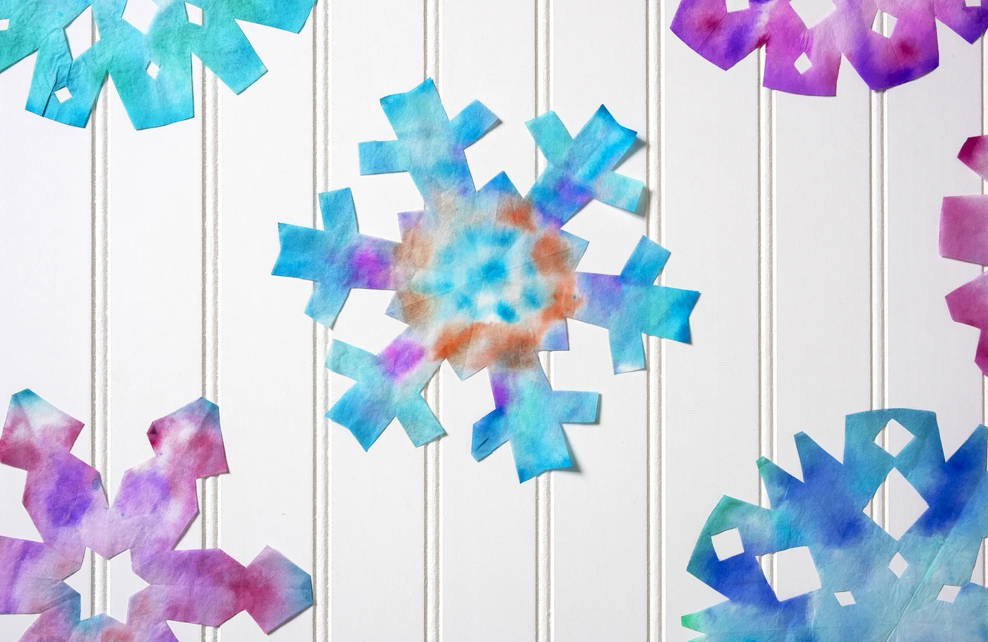 Coffee Filter Snowflakes for Winter Fun - DIY Candy