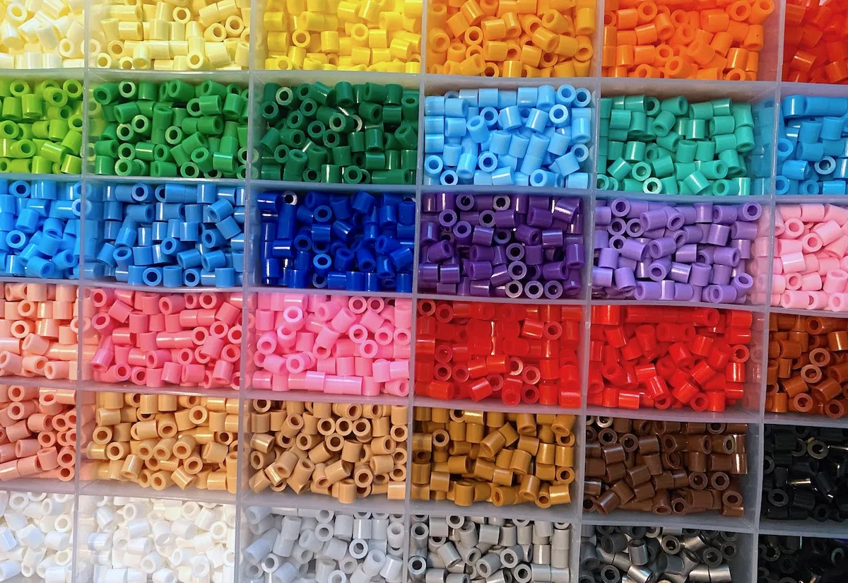 Tray of a variety of colors of hama beads