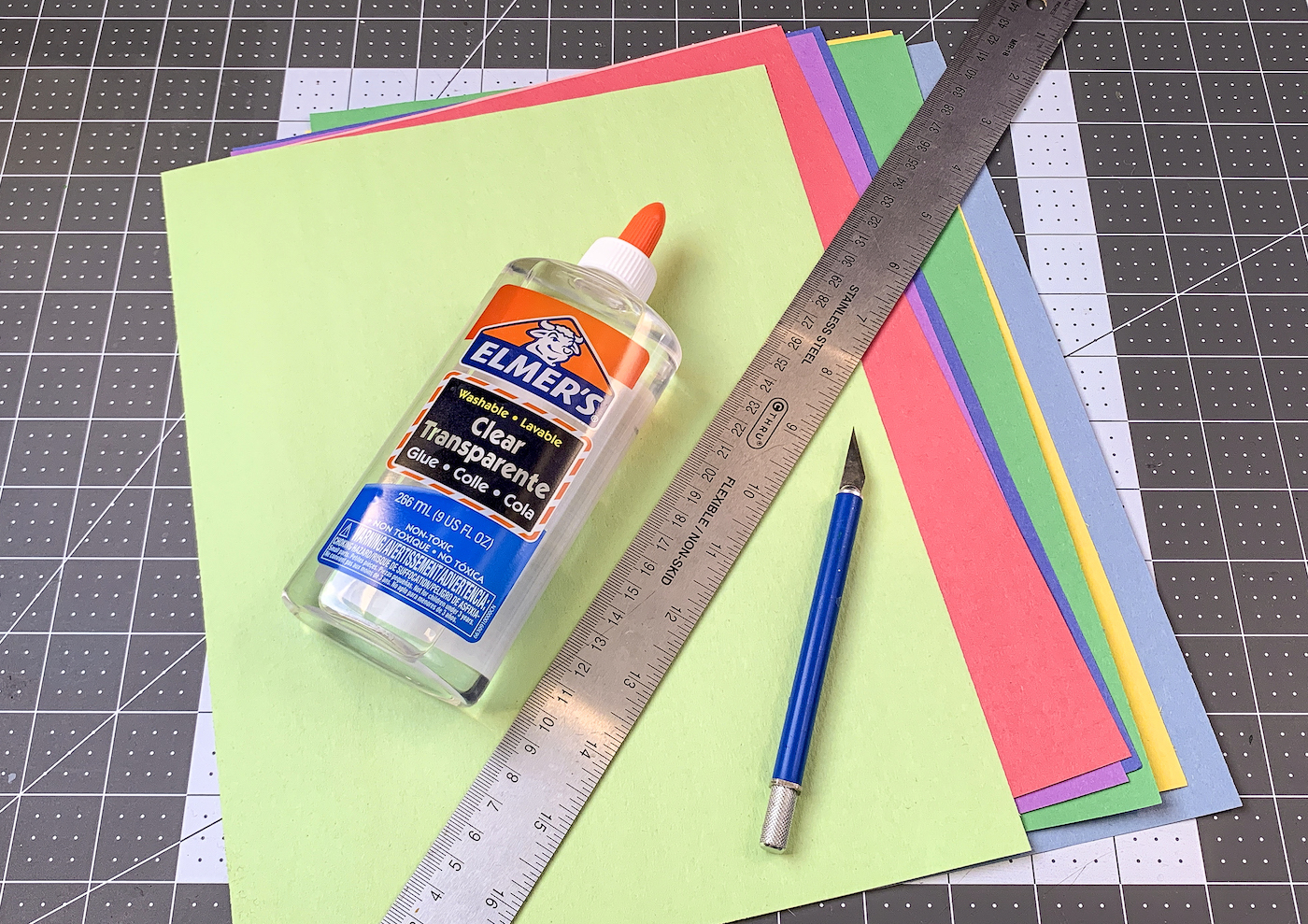 Cardstock, ruler, glue, and a craft knife