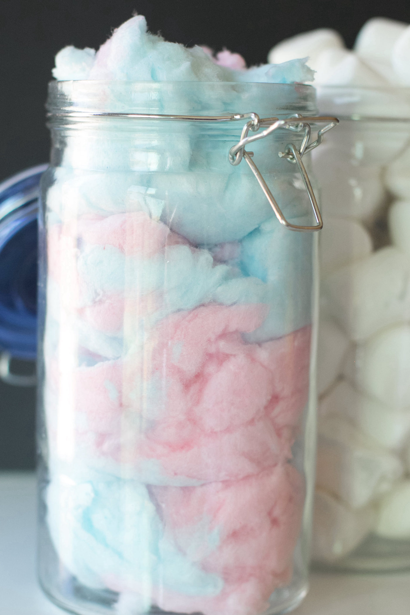 Jar of cotton candy and jar of marshmallows