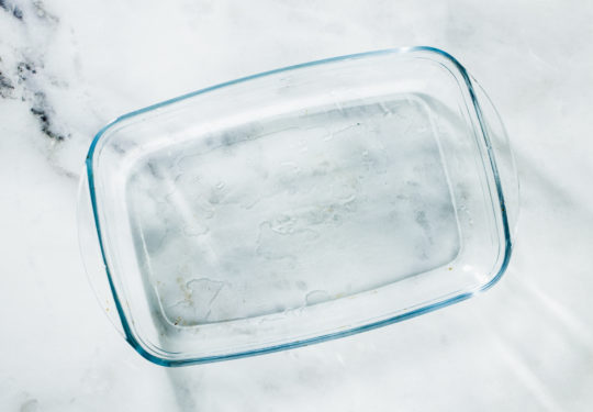 Glass pan for baking on a marble table