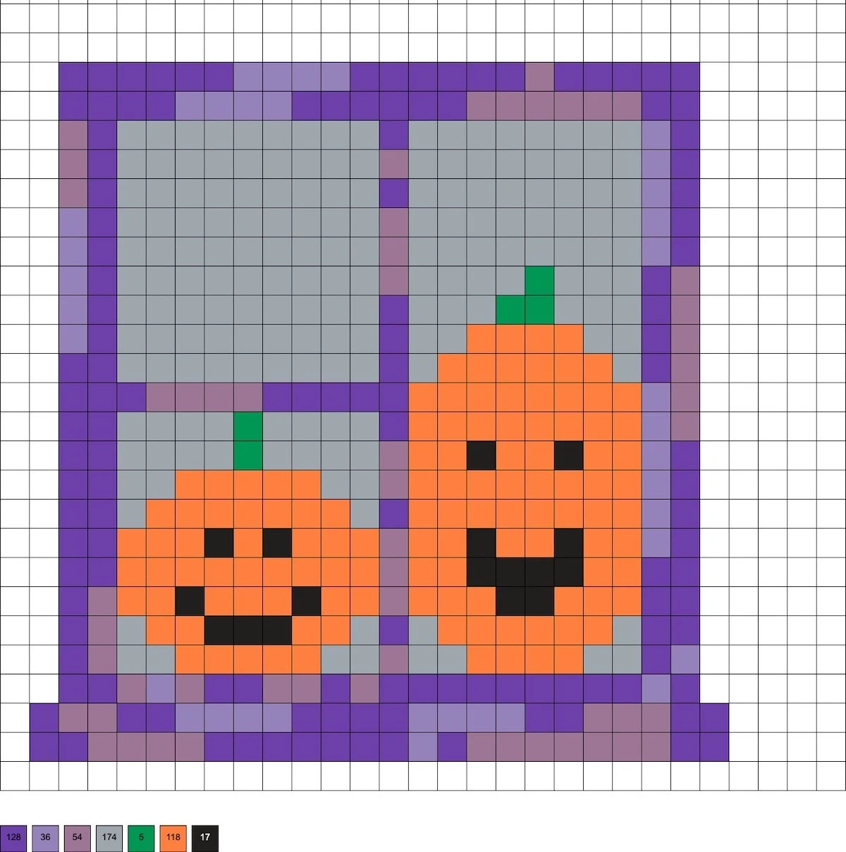two pumpkins in a window