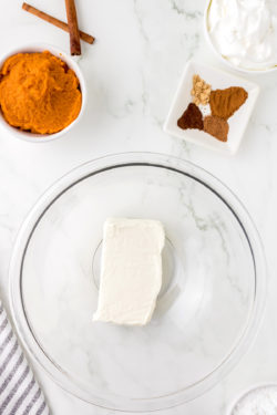 Cream cheese in a clear glass bowl