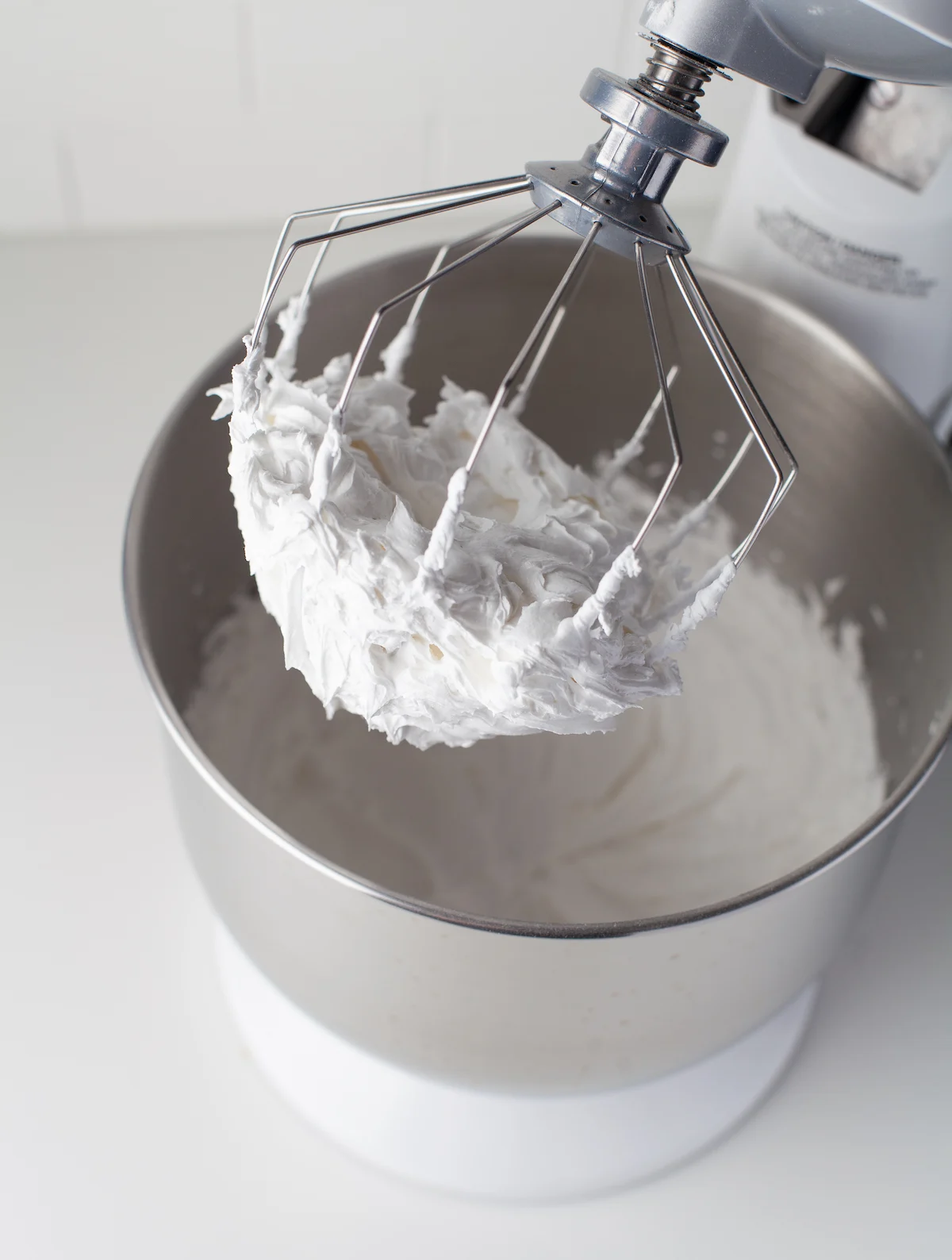 Icing ingredients whisked together in a bowl