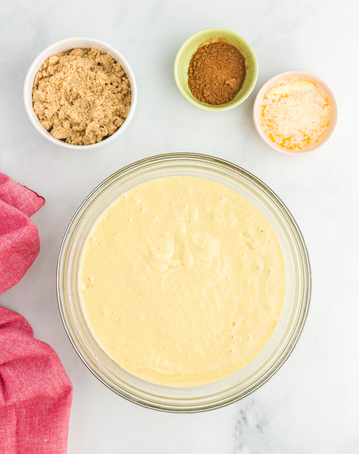 beat together cake mix, unsweetened applesauce, eggs and vegetable oil