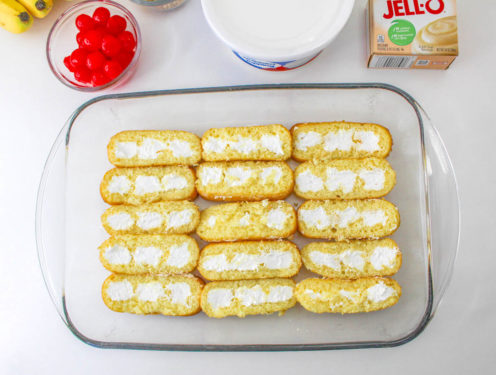 Lining the bottom of a dish with Twinkies cut in half