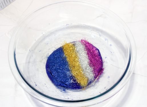 Folding glitter colors into the slime