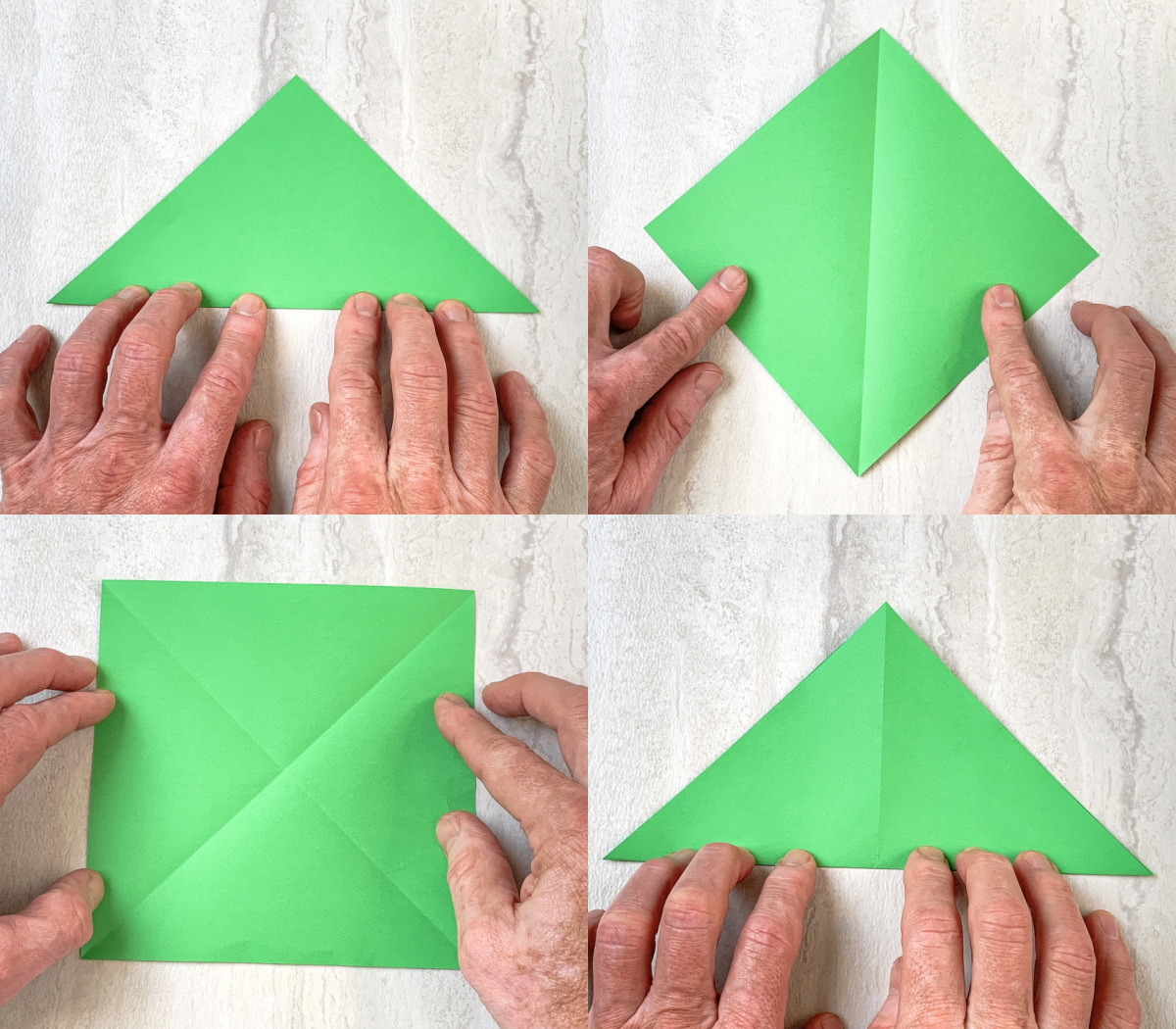 fold the green paper into a triangle then open and fold the other way