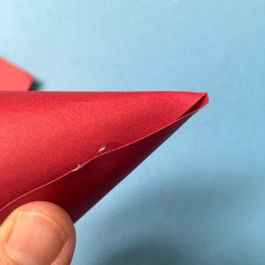 Gluing the topper with hot glue