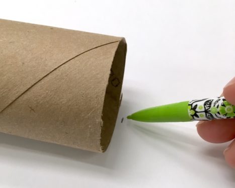 Trace a toilet paper roll on the back of paper with a pencil