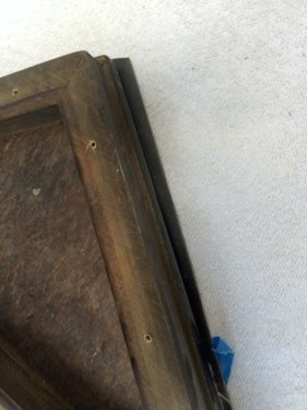 edge of the table after cutting off excess flooring