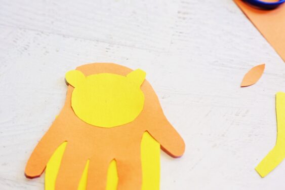 Glue Head to Palm of Handprint
